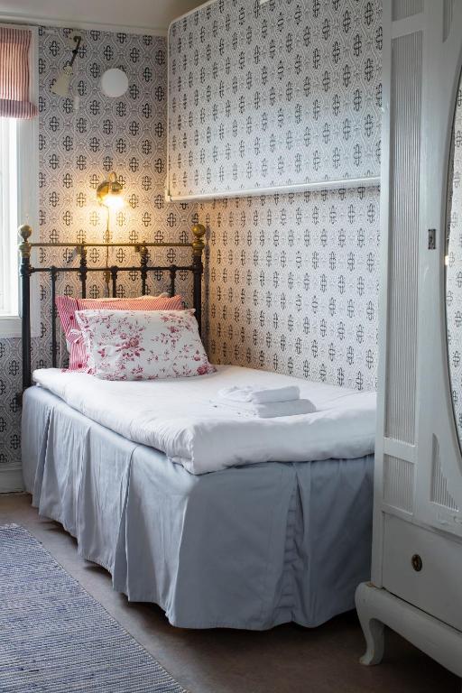 Postel nebo postele na pokoji v ubytování Strandvillan Hotell och Bed & Breakfast