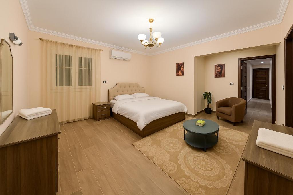 Postel nebo postele na pokoji v ubytování Cairo Airport Inn