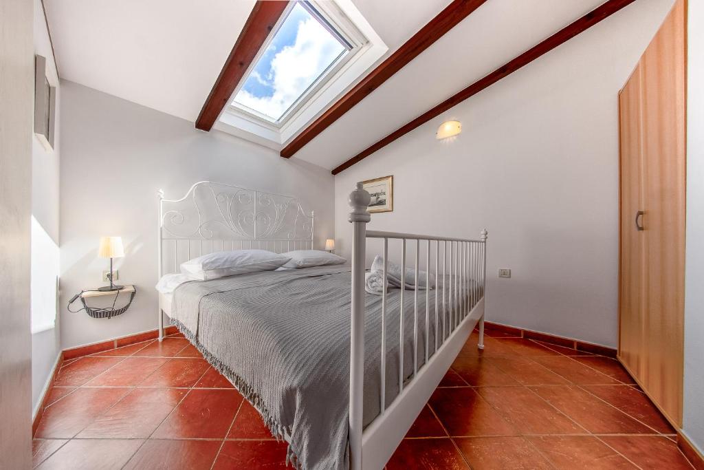Posteľ alebo postele v izbe v ubytovaní Seaside apartments Petar