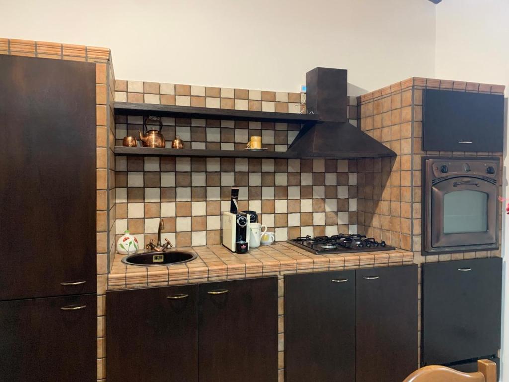 Kuchyň nebo kuchyňský kout v ubytování Momon1616 Intero Chalet