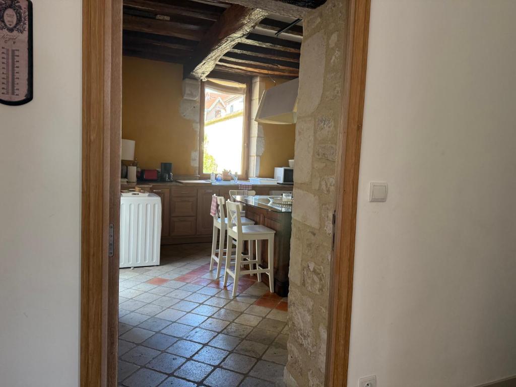 Kuchyň nebo kuchyňský kout v ubytování Maison des 7 lieux