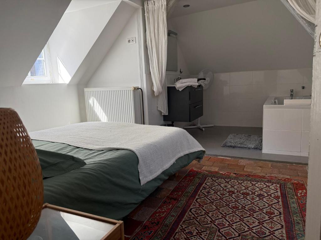 Postel nebo postele na pokoji v ubytování Maison des 7 lieux