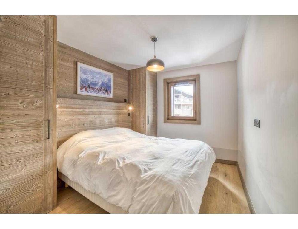 Posteľ alebo postele v izbe v ubytovaní Luxurious 4-room with pool, gym, spa and parking