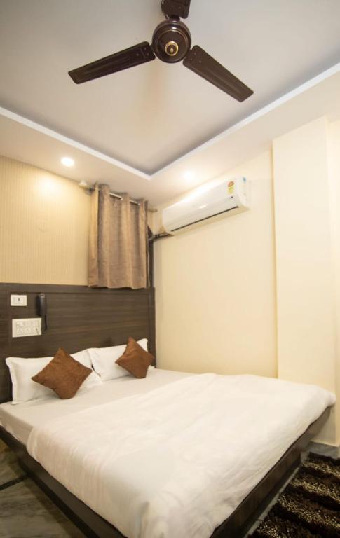 Letto o letti in una camera di SONA NEW DELHI RAILWAY Station