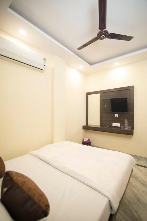Letto o letti in una camera di SONA NEW DELHI RAILWAY Station