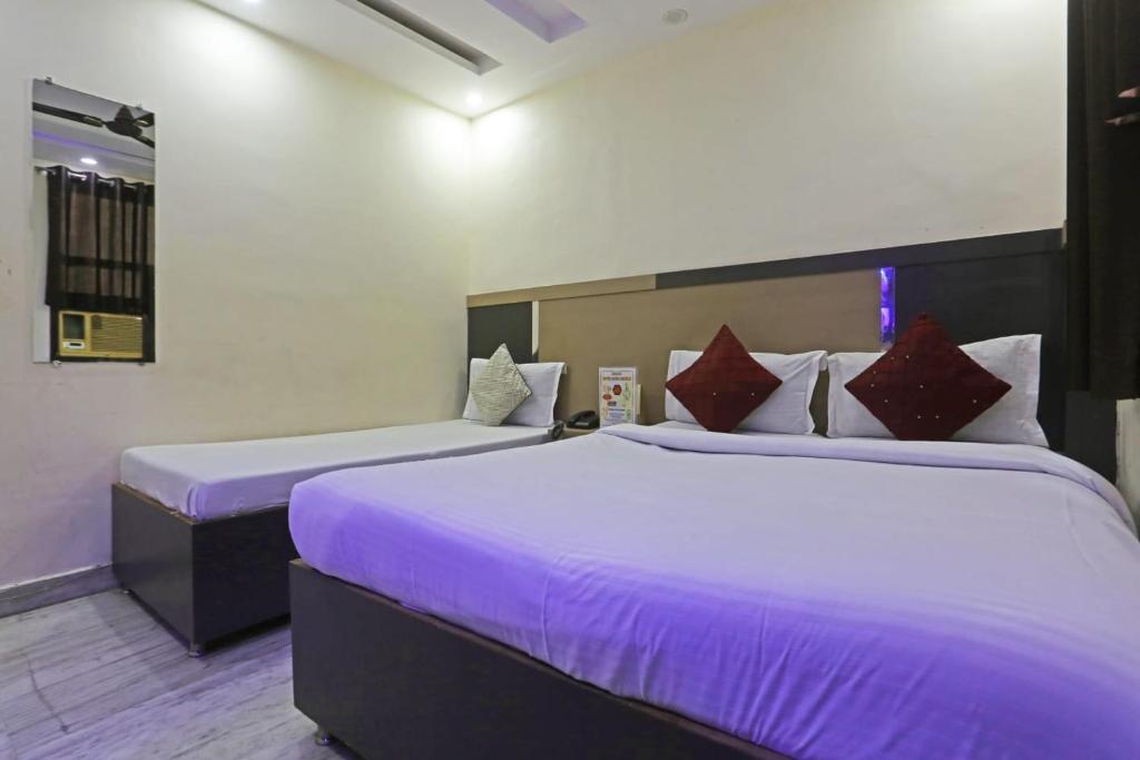 Letto o letti in una camera di SONA NEW DELHI RAILWAY Station