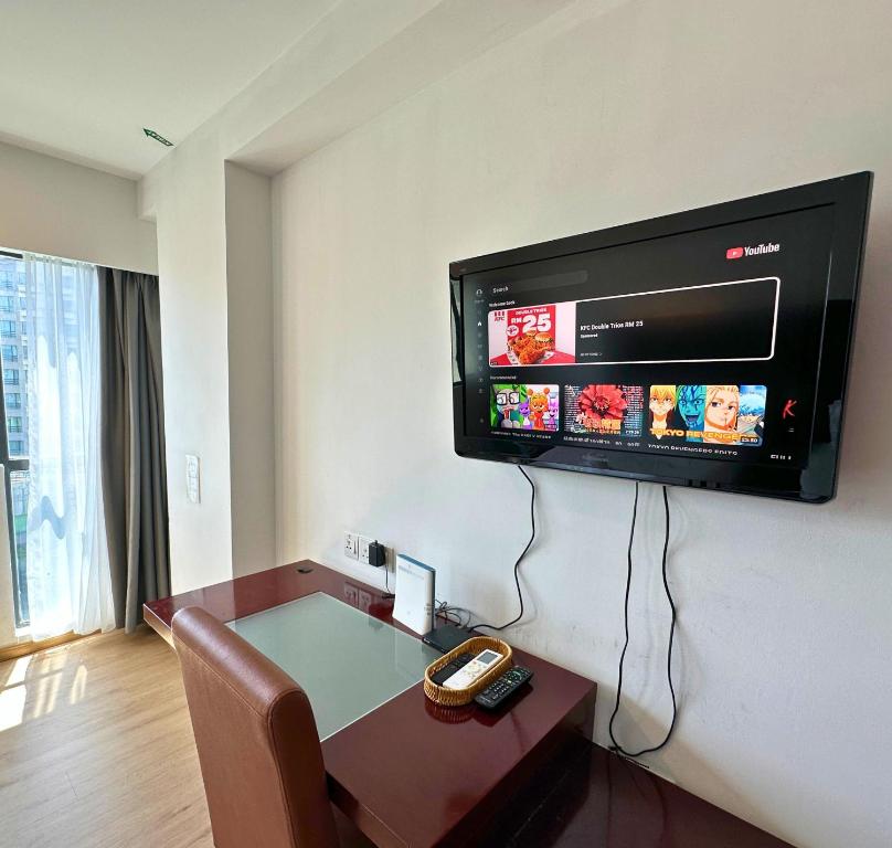 TV o dispositivi per l'intrattenimento presso Ming Greenage Suite 明绿时代套房 @Kota Kinabalu 亚庇市中心