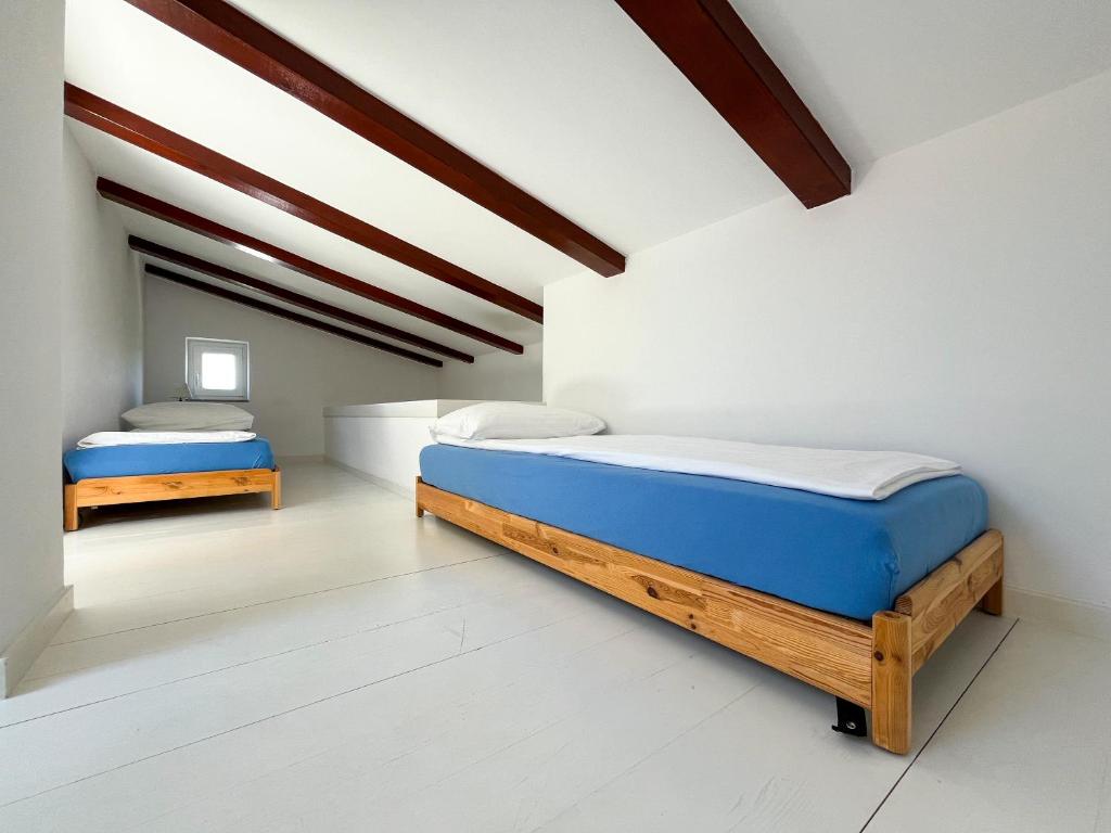 Posteľ alebo postele v izbe v ubytovaní Seaside apartments Petar