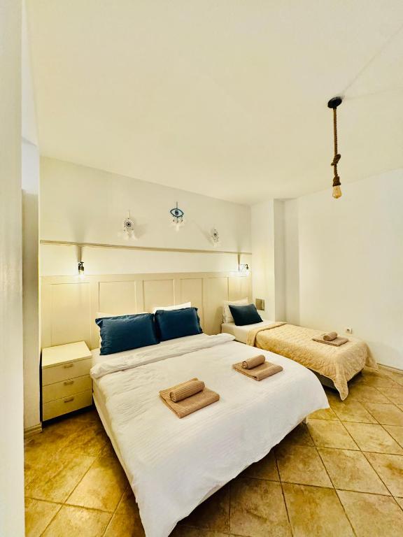 Postel nebo postele na pokoji v ubytování Budva Felix Suites