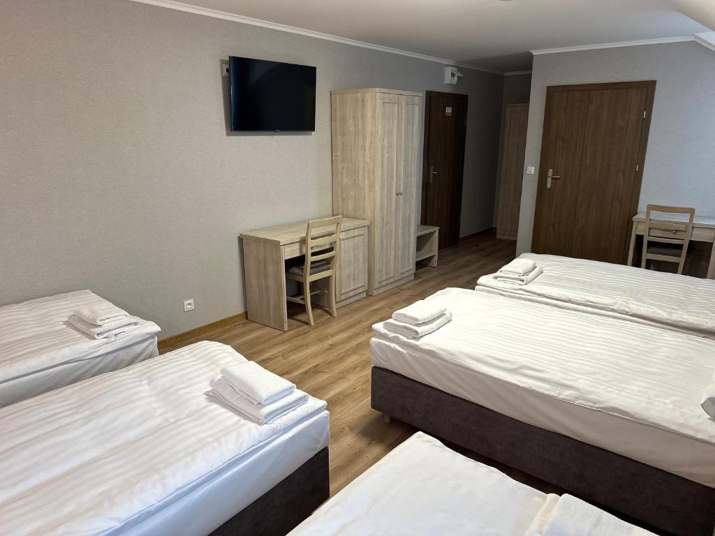 Postel nebo postele na pokoji v ubytování Karczma u Jakuba