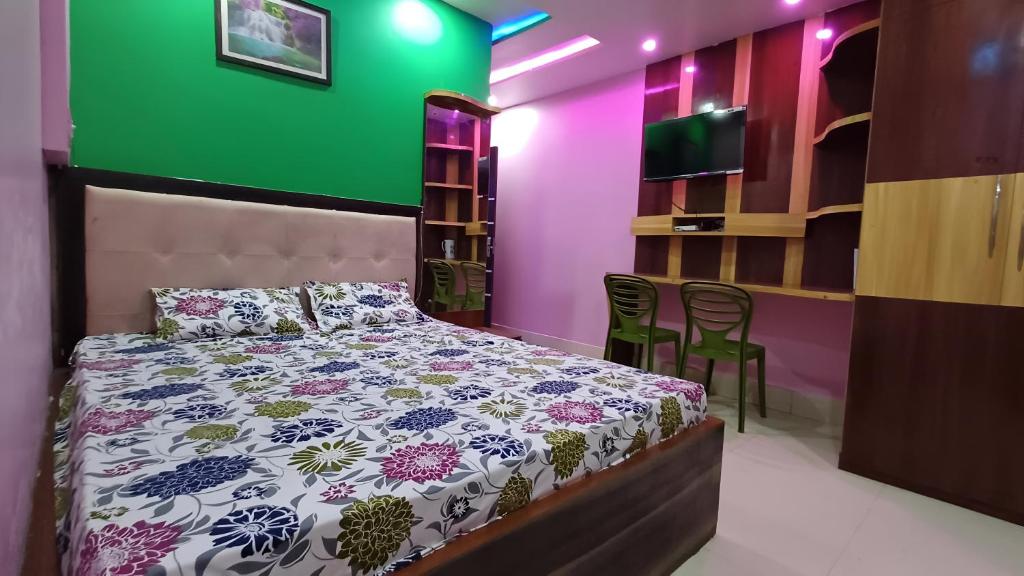 Postel nebo postele na pokoji v ubytování Roxy Hotel - Near New Digha Beach