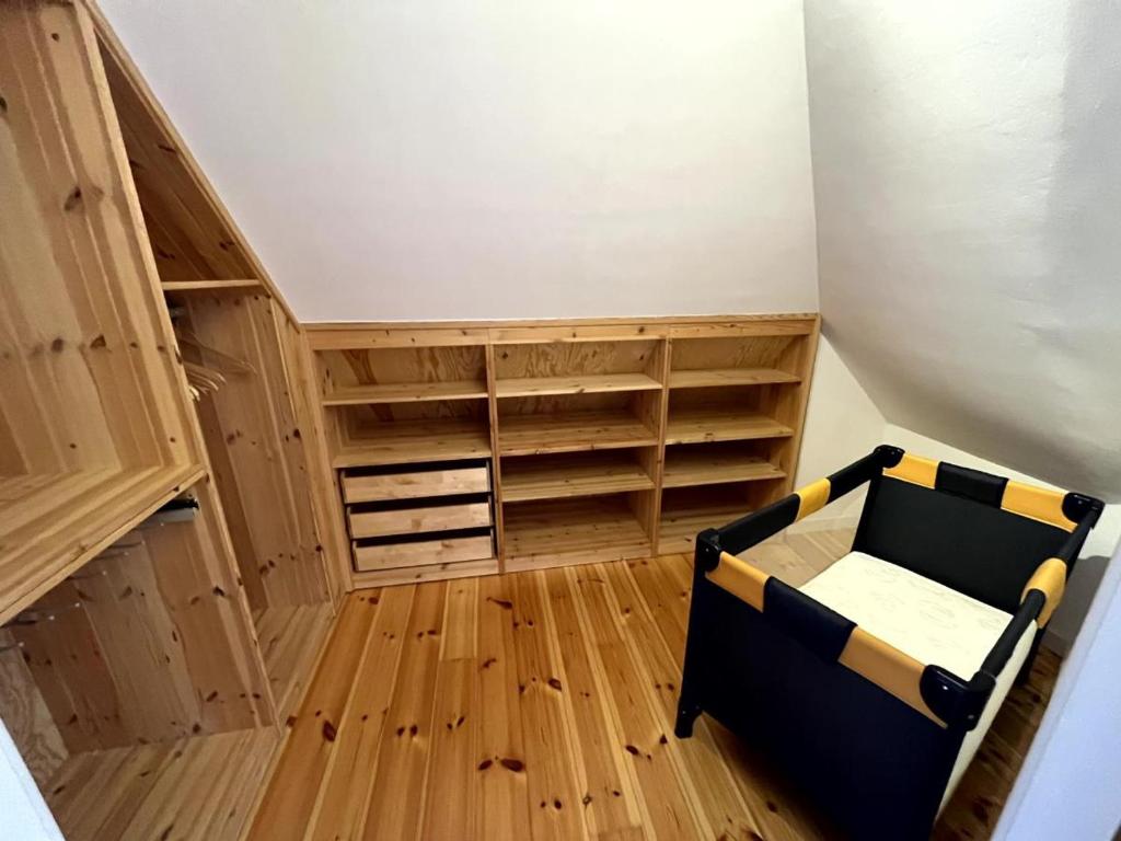 Postel nebo postele na pokoji v ubytování Ferienhaus Fiete in Wieck