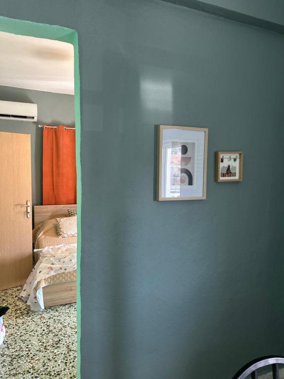 Postel nebo postele na pokoji v ubytování ZeusPlace Akti Platamonas