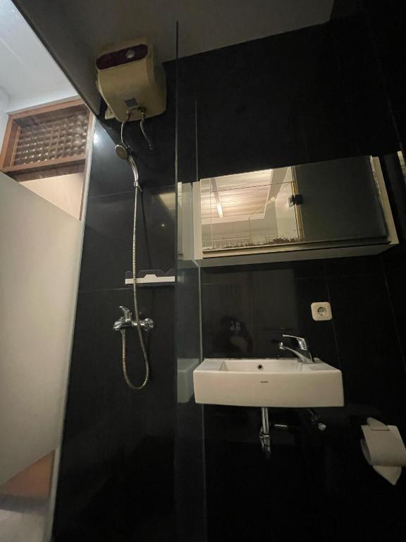 Koupelna v ubytování RedDoorz Plus near Parahyangan University