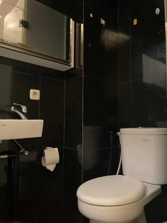 Koupelna v ubytování RedDoorz Plus near Parahyangan University