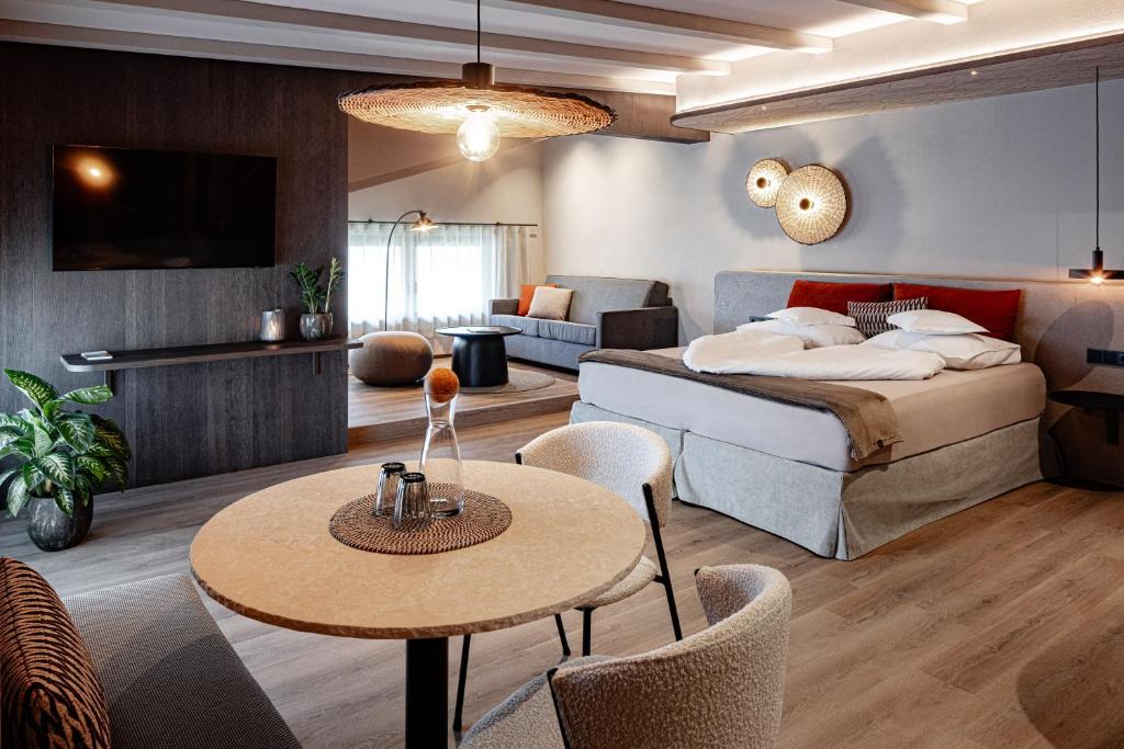 Postel nebo postele na pokoji v ubytování Nutzhof - Mediterran Flair Hotel