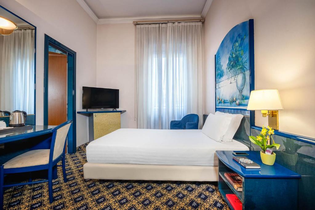 TV a/nebo společenská místnost v ubytování iH Hotels Milano Ambasciatori