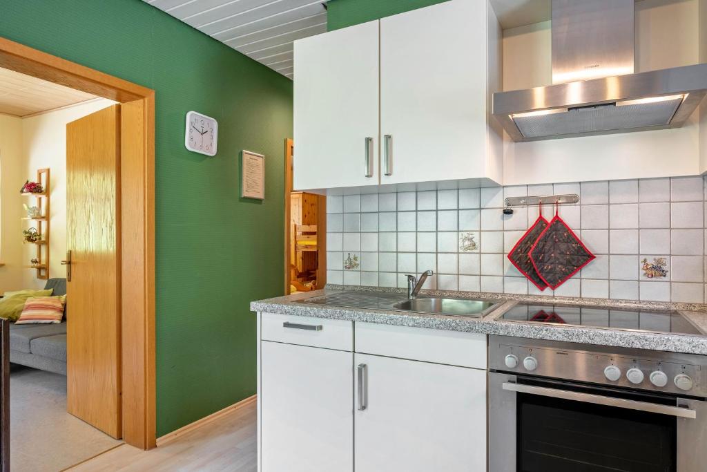 Kuchyň nebo kuchyňský kout v ubytování Klausseppenhof