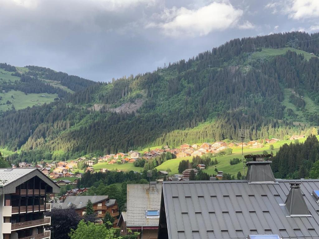 a city with a mountain in the background at Appartement 290 Moulin B - 1200 Châtel - Linga in Châtel