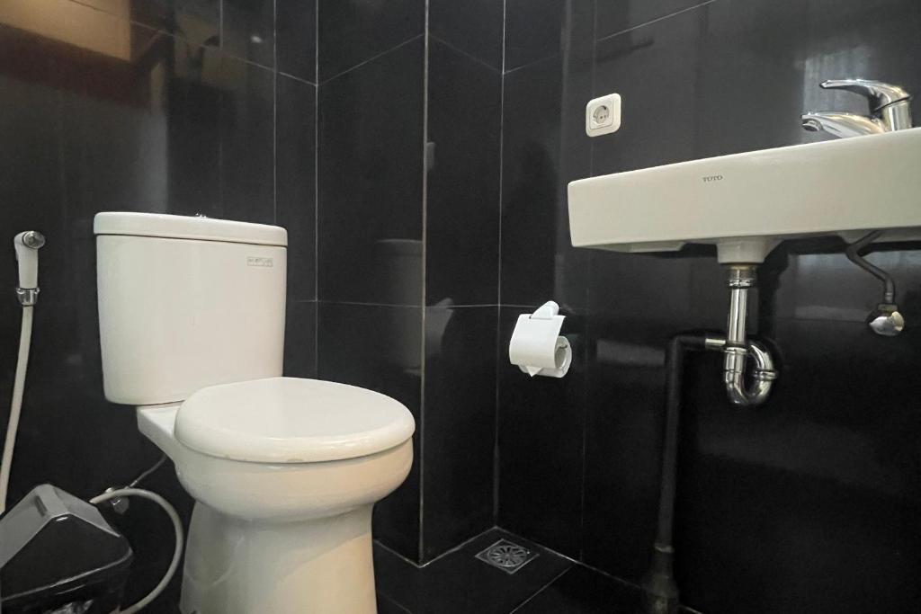Koupelna v ubytování RedDoorz Plus near Parahyangan University