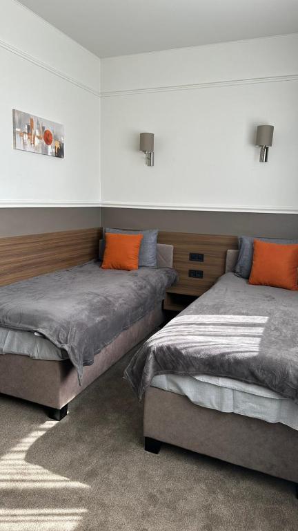 Postel nebo postele na pokoji v ubytování Mini Hotel on Brovarskaya