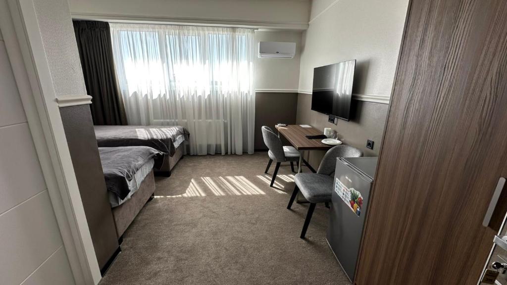 Postel nebo postele na pokoji v ubytování Mini Hotel on Brovarskaya
