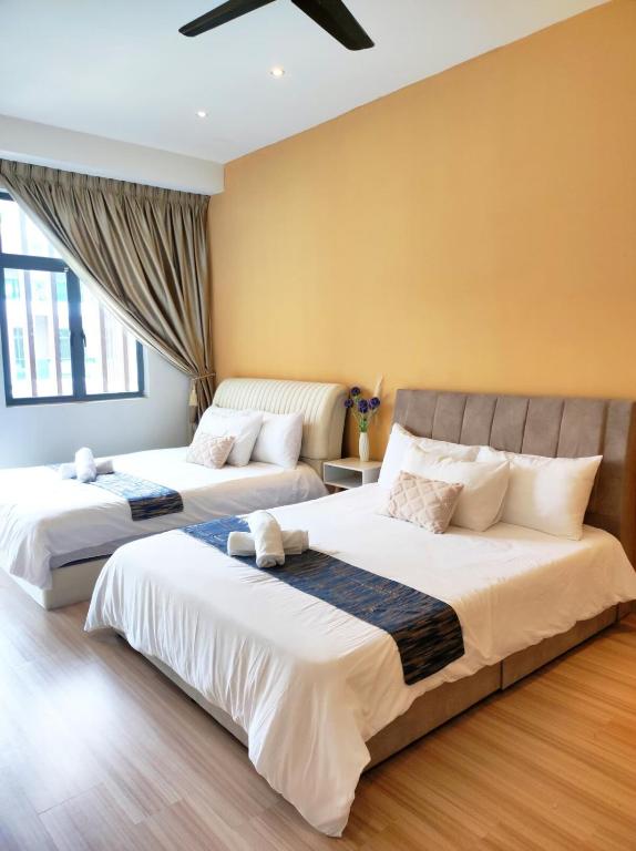 Postel nebo postele na pokoji v ubytování Cyberjaya Puchong JWJ Pool Villa
