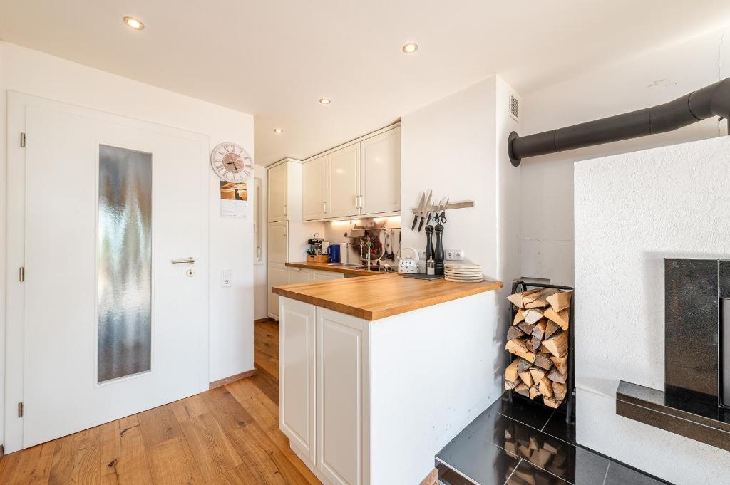 Kuchyň nebo kuchyňský kout v ubytování StoderGarden Apartment - by myNests