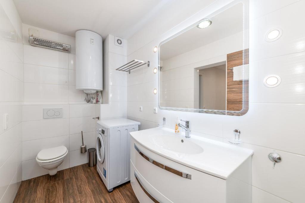 Koupelna v ubytování StoderGarden Apartment - by myNests