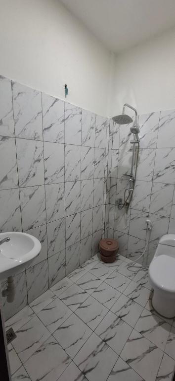 Koupelna v ubytování Homestay Sa'adah