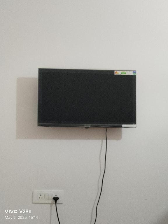 TV a/nebo společenská místnost v ubytování Guest house inn