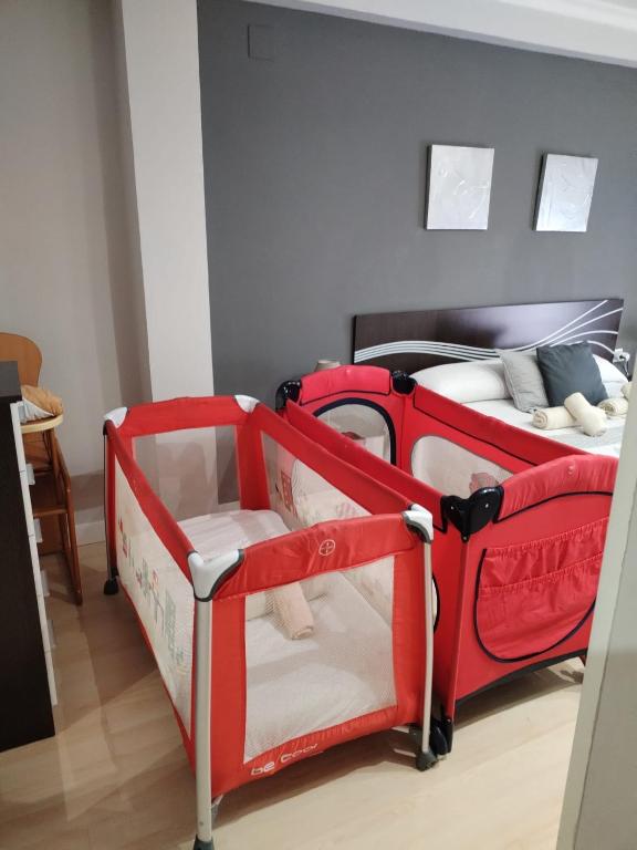 Posteľ alebo postele v izbe v ubytovaní Apartamento con parking privado gratis incluido