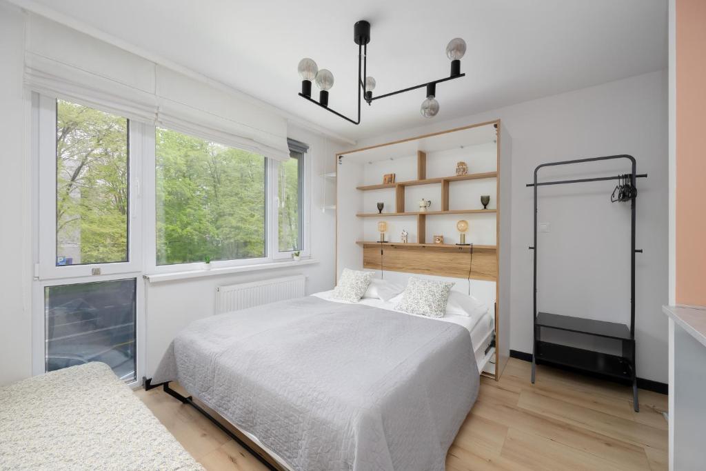 Posteľ alebo postele v izbe v ubytovaní Pet-friendly Studio Apartments Batorego Warsaw by Noclegi Renters