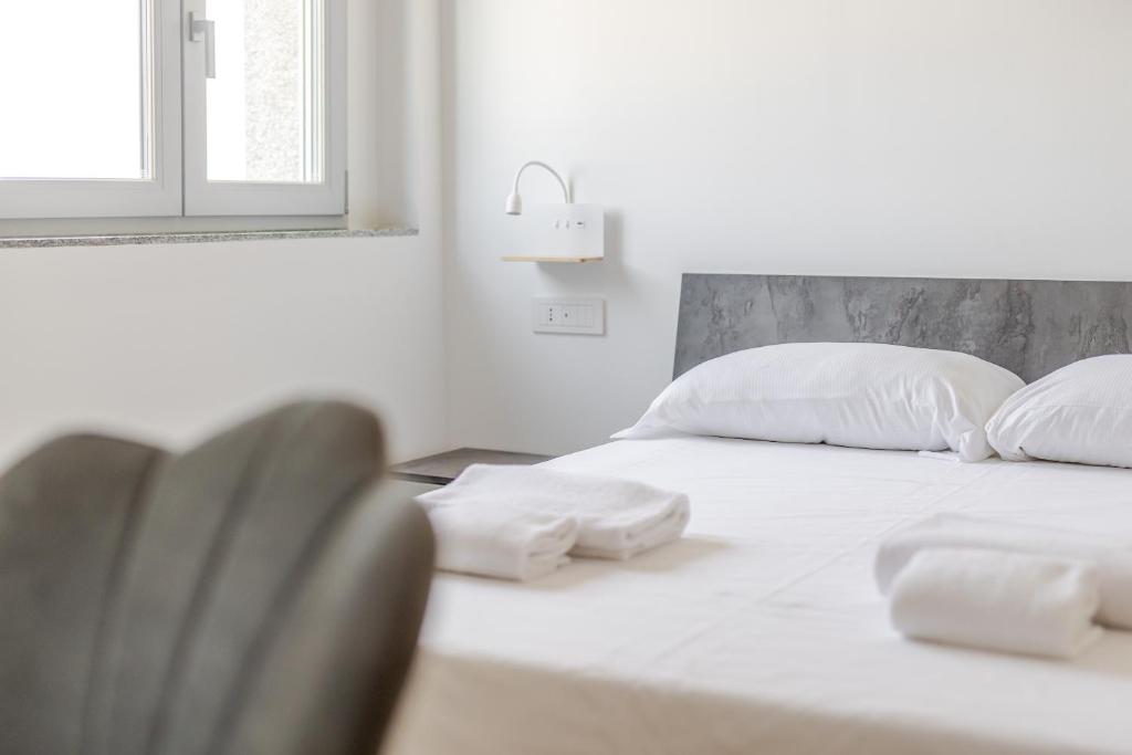 Postel nebo postele na pokoji v ubytování DandT HOME
