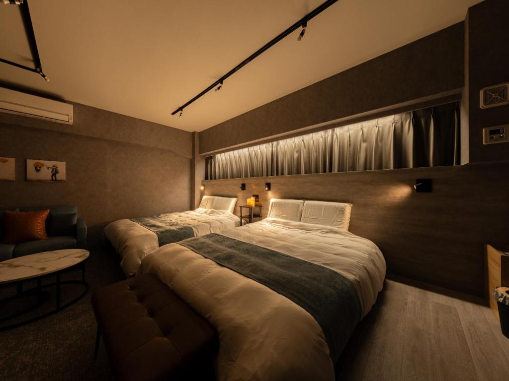 Voodi või voodid majutusasutuse Akihabara Sta 13min, Kanda Sta 10min,Ogawamachi 2min,Hotel Prime Inn Kanda, toas