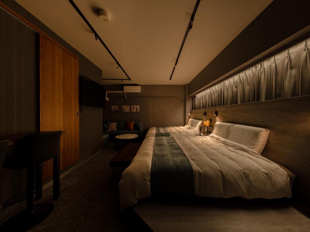 Voodi või voodid majutusasutuse Akihabara Sta 13min, Kanda Sta 10min,Ogawamachi 2min,Hotel Prime Inn Kanda, toas