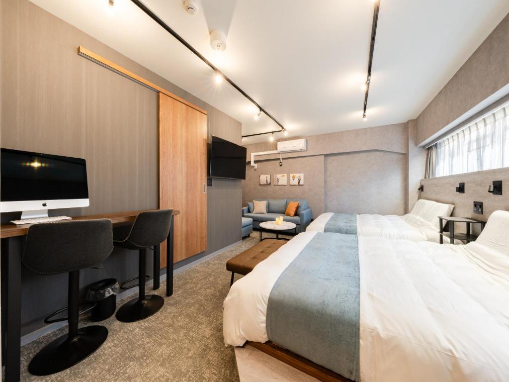 Voodi või voodid majutusasutuse Akihabara Sta 13min, Kanda Sta 10min,Ogawamachi 2min,Hotel Prime Inn Kanda, toas