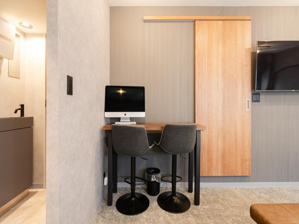 Televiisor ja/või meelelahutuskeskus majutusasutuses Akihabara Sta 13min, Kanda Sta 10min,Ogawamachi 2min,Hotel Prime Inn Kanda,