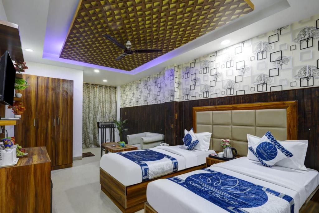 Postel nebo postele na pokoji v ubytování Hotel Armani Deluxe By SMART GROUP