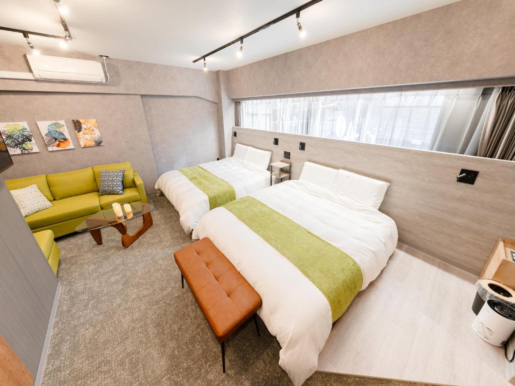 Voodi või voodid majutusasutuse Akihabara Sta 13min, Kanda Sta 10min,Ogawamachi 2min,Hotel Prime Inn Kanda, toas