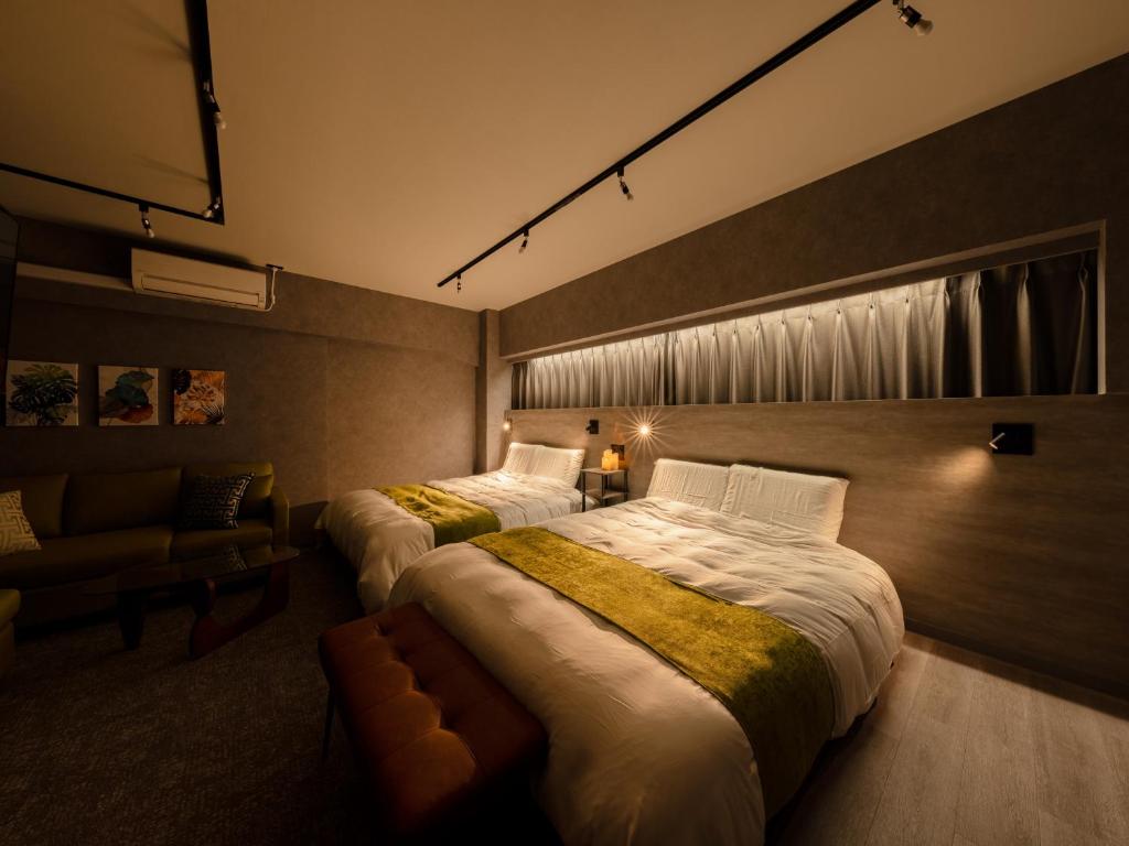 Voodi või voodid majutusasutuse Akihabara Sta 13min, Kanda Sta 10min,Ogawamachi 2min,Hotel Prime Inn Kanda, toas