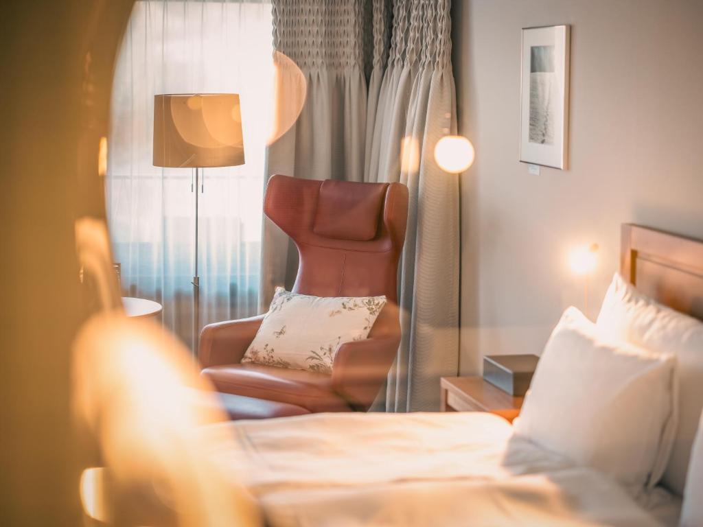 Postel nebo postele na pokoji v ubytování Resort Hof Weissbad