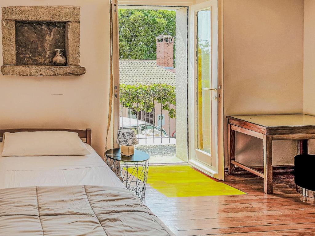Posteľ alebo postele v izbe v ubytovaní Holiday Home Erika by Interhome