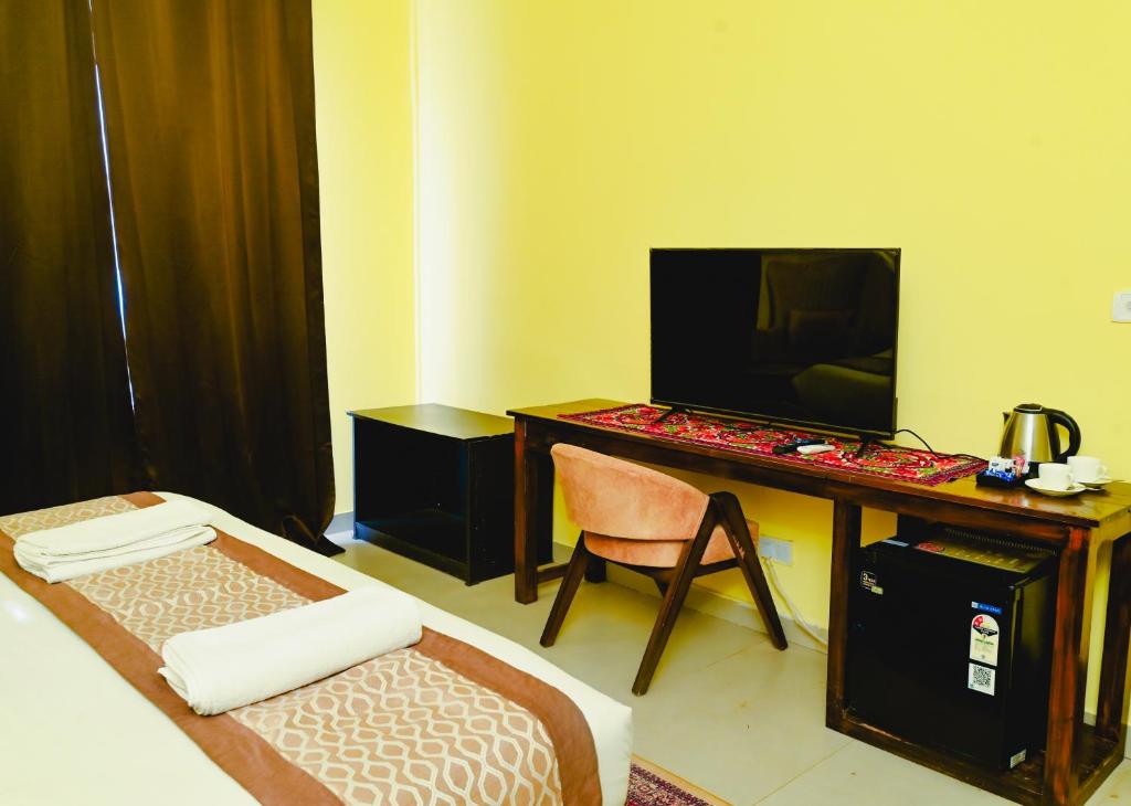 TV a/nebo společenská místnost v ubytování Ashvem beach resort