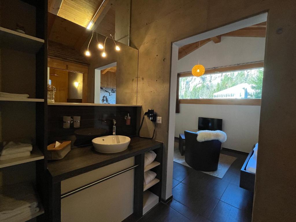 Koupelna v ubytování Hüttenhotel Husky Lodge