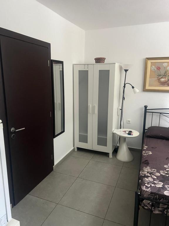A bed or beds in a room at Centrally Located Private Rooms