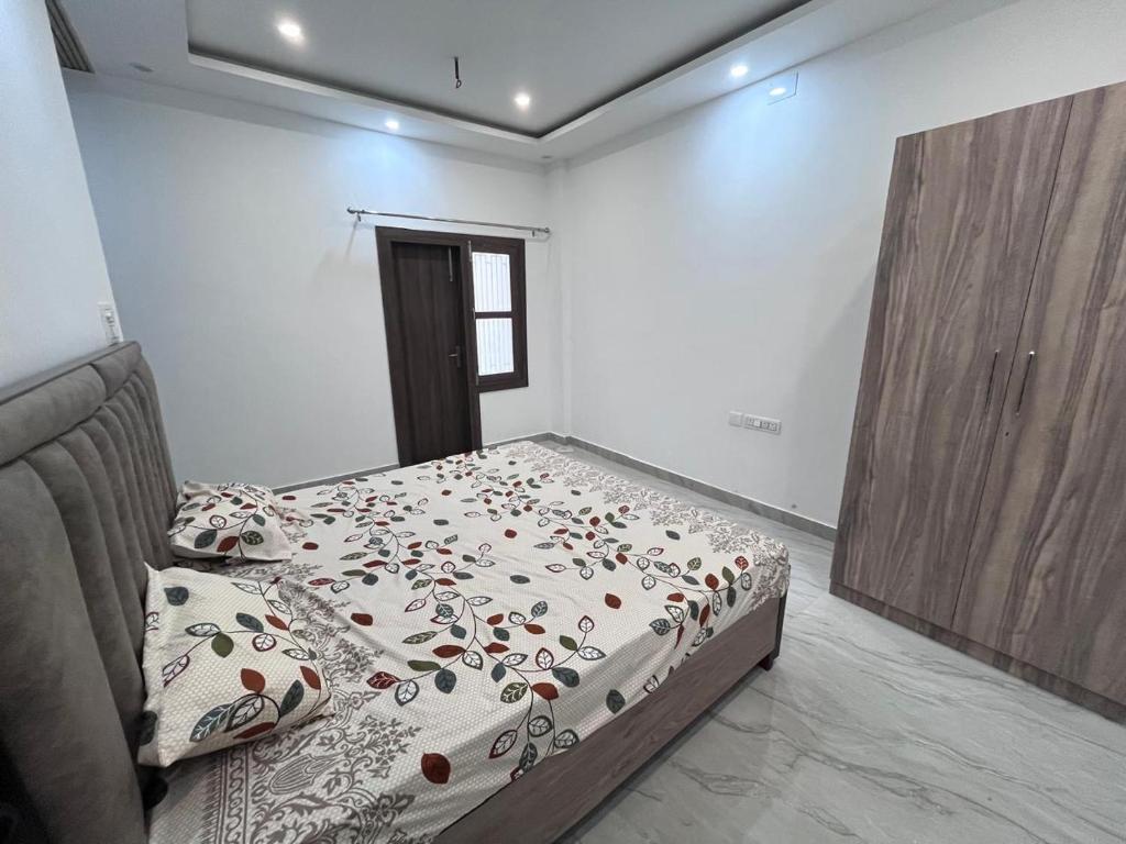 Postel nebo postele na pokoji v ubytování Hridayam Kashi Homestay