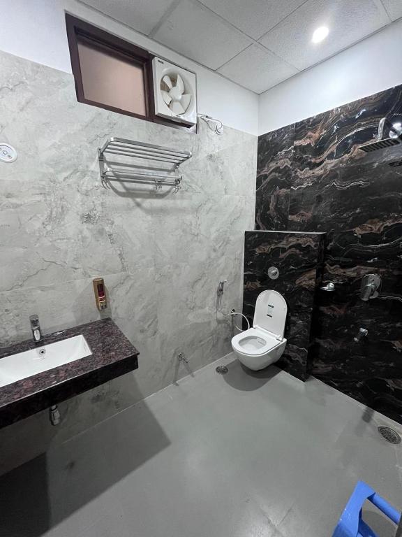 Koupelna v ubytování Hridayam Kashi Homestay