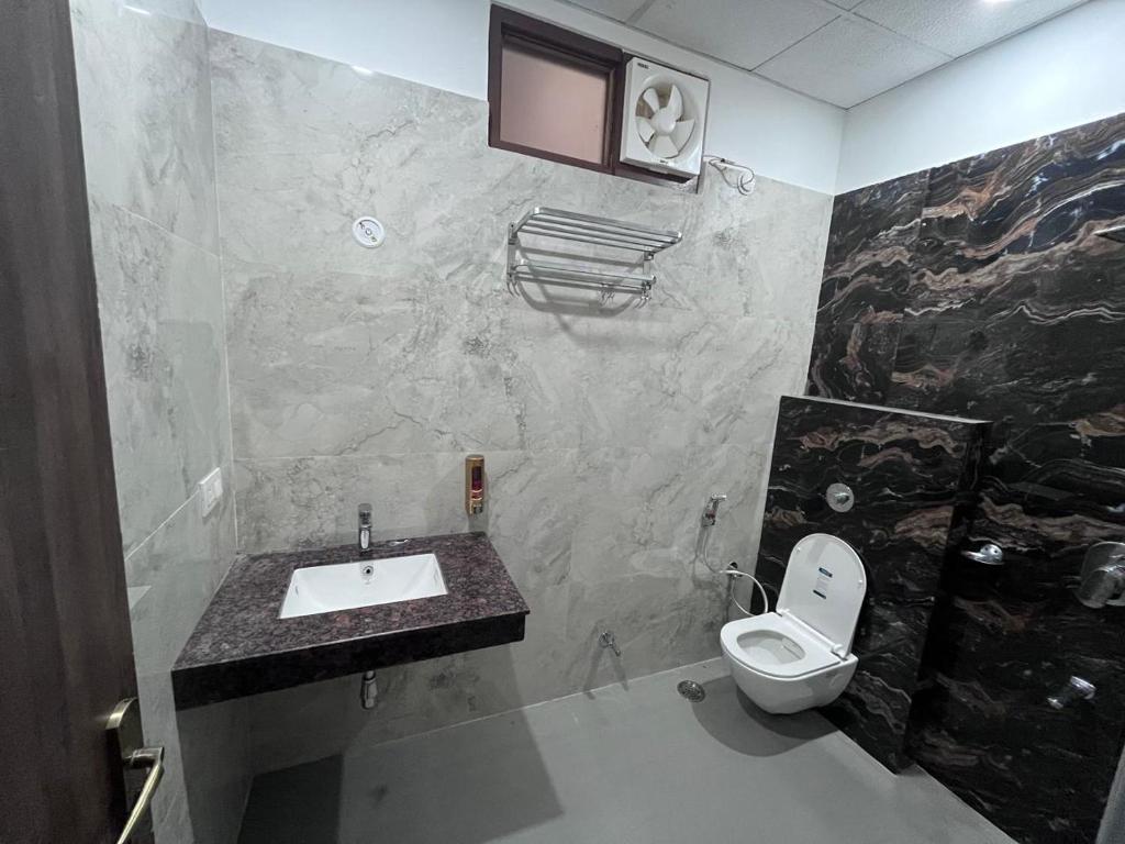 Koupelna v ubytování Hridayam Kashi Homestay