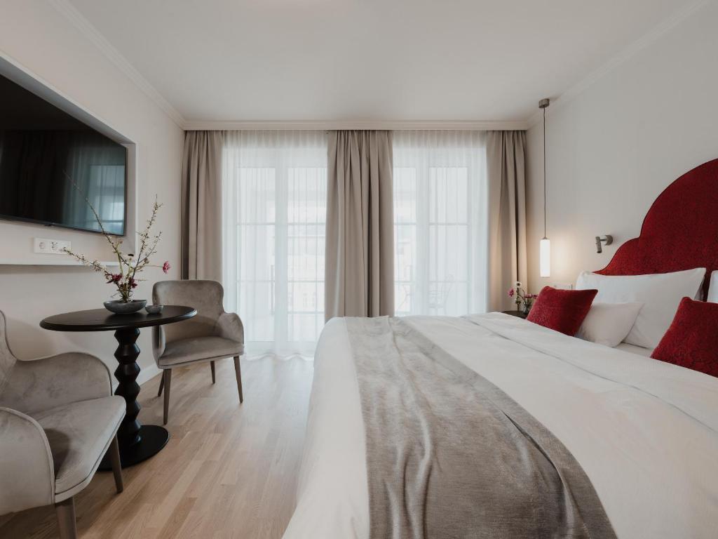 Letto o letti in una camera di Grand Elisabeth